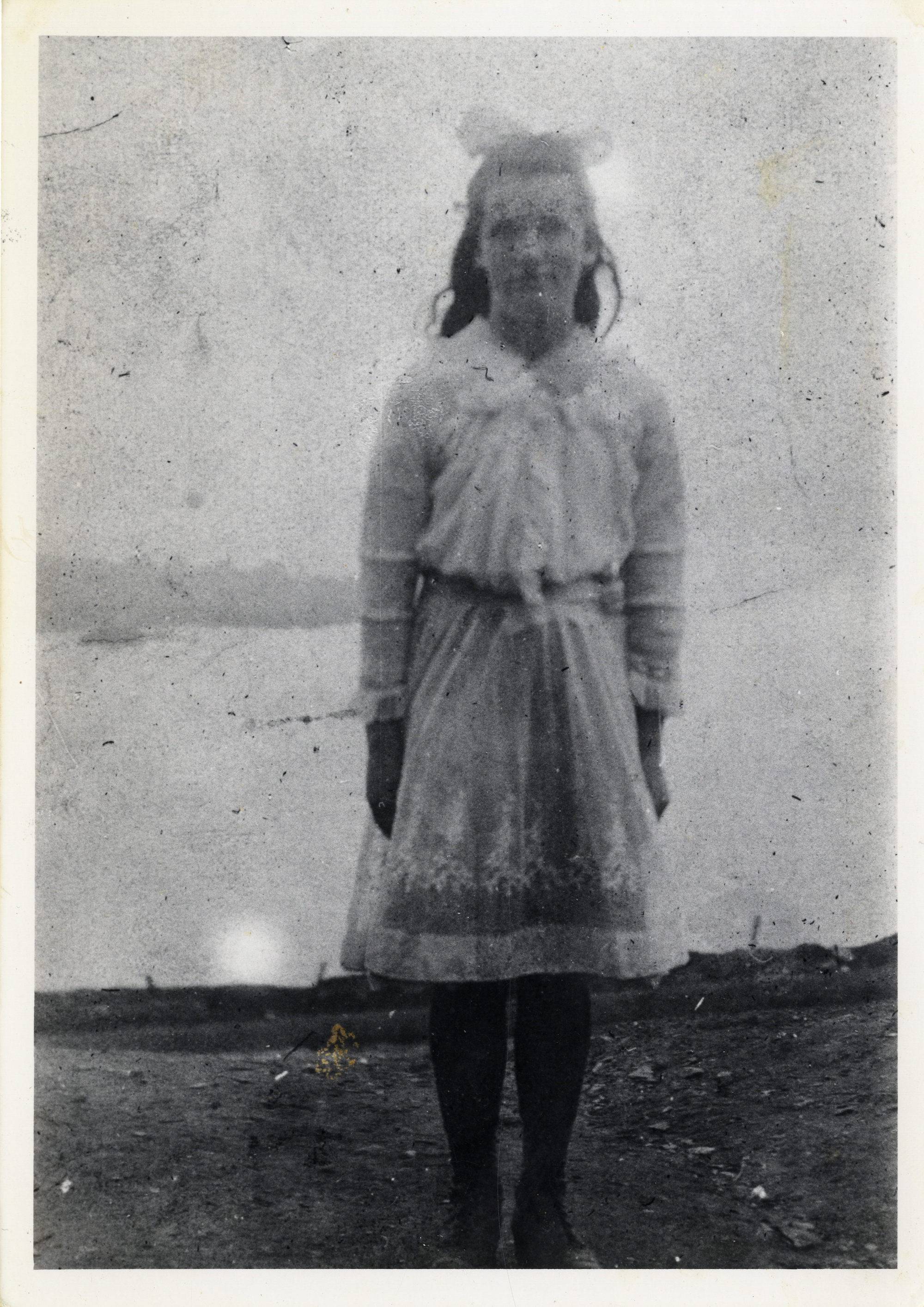 Eilís Buffer Keane on her Confirmation Day on the Island. She is wearing what was once her aunt's wedding dress, which had been sent home from America and cut to size for the occasion. c.1919.